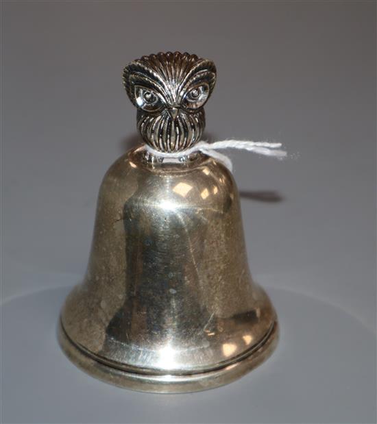 A silver hand bell with owl finial, Wakely & Wheeler, London, 1958 84mm.